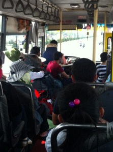 With his green hat and hand on bag, Tom stood up to the (bus) mafia!