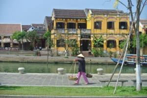 Local street urchin walking along the river