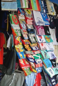 Central market Phnom Pehn: John treated himself to 4 tshirts for 1 (0) dollar (s)